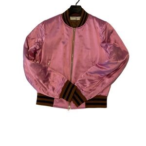 This is a Dries Van Noten pink bomber jacket. Maid from satin.